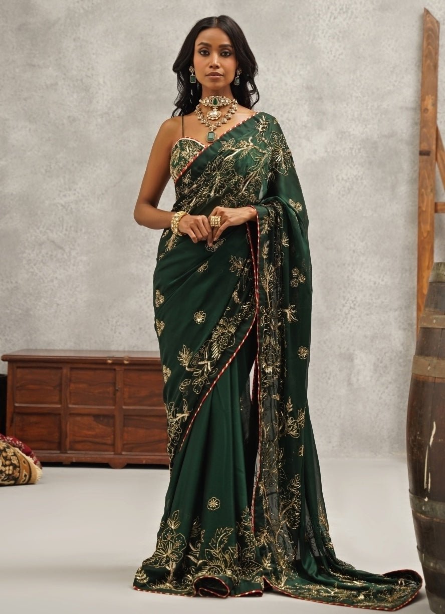 Emerald green embroidered georgette wedding saree — anniversary and festive occasions