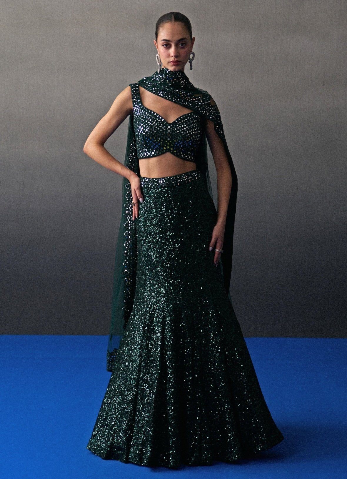Emerald green sequins lehenga for destination wedding guests