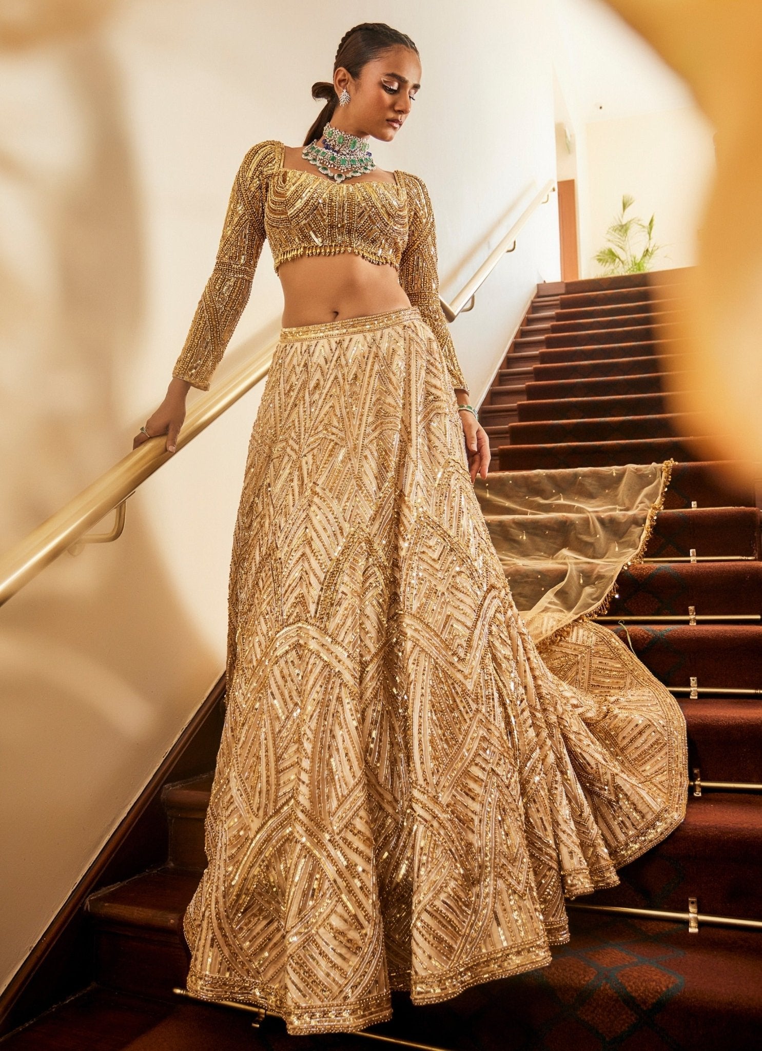 Gold palette nikaah bridal colours — glam gold satin lehenga for an evening indoor nikaah venue