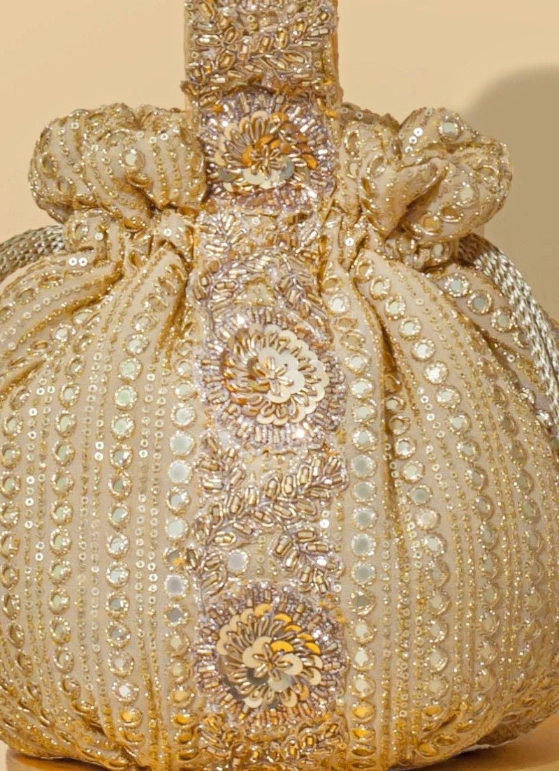 Amyra Gold Embroidered Georgette PotliFabilicious Fashion