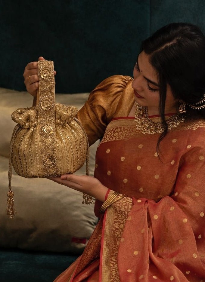 Amyra Gold Embroidered Georgette PotliFabilicious Fashion