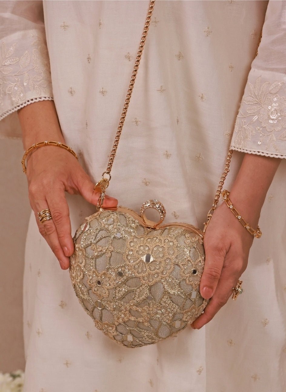 Amyra Gold Embroidered Tissue Heart ClutchFabilicious Fashion
