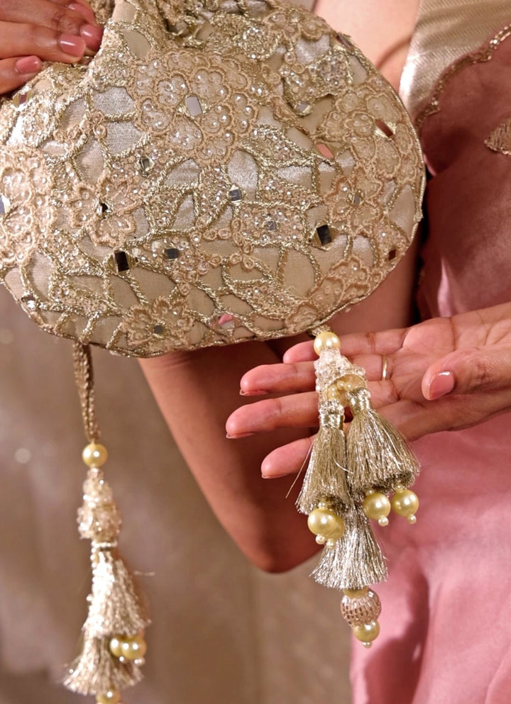 Amyra Gold Embroidered Tissue PotliFabilicious Fashion