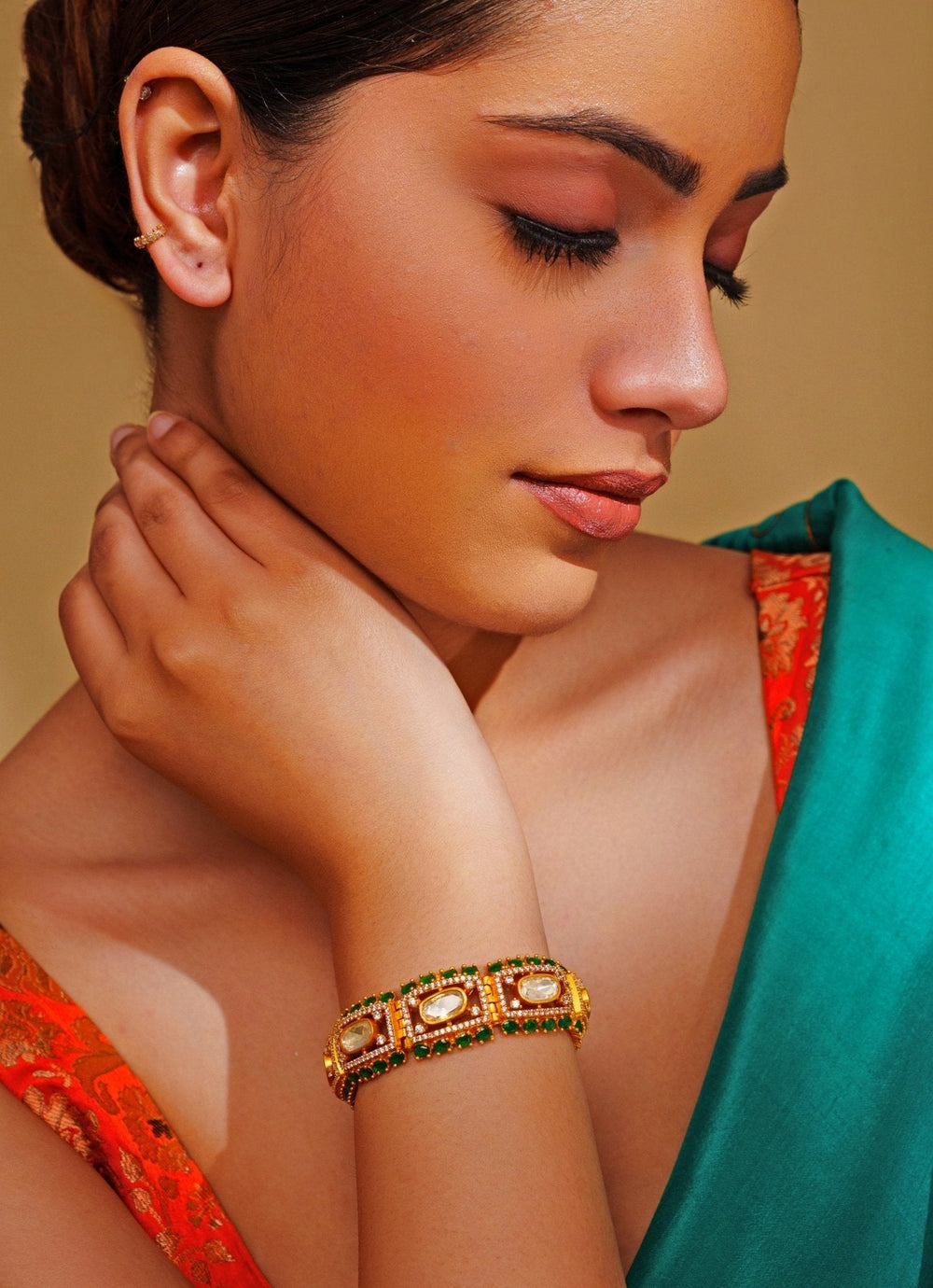 Gold Finish Bracelet With Moissanite Polki And Green Stones Zevar by Geeta - Fabilicious Fashion