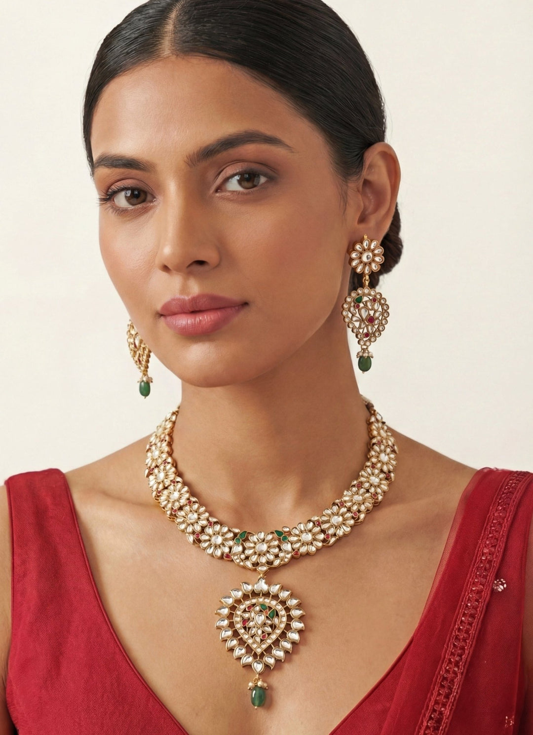 Zevar by Geeta Gold Finish Green Pearl Flower Kundan Necklace SetFabilicious Fashion