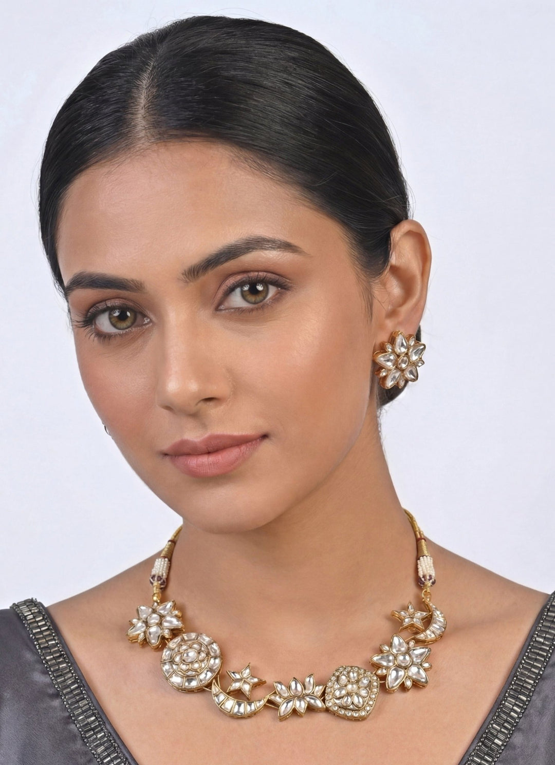 Zevar by Geeta Gold Finish Kundan And Motifs Necklace SetFabilicious Fashion