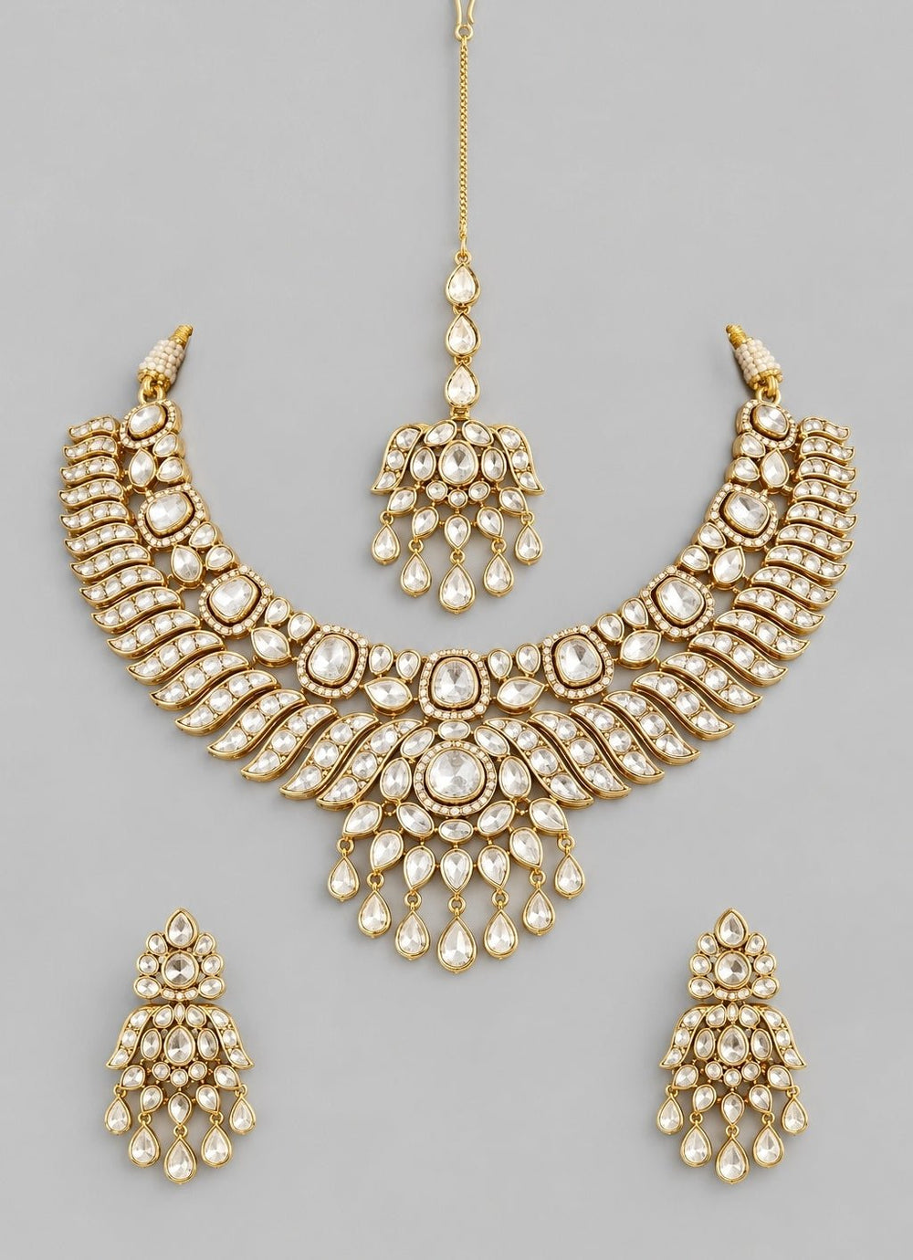 Zevar by Geeta Gold Finish Kundan Bridal Necklace SetFabilicious Fashion