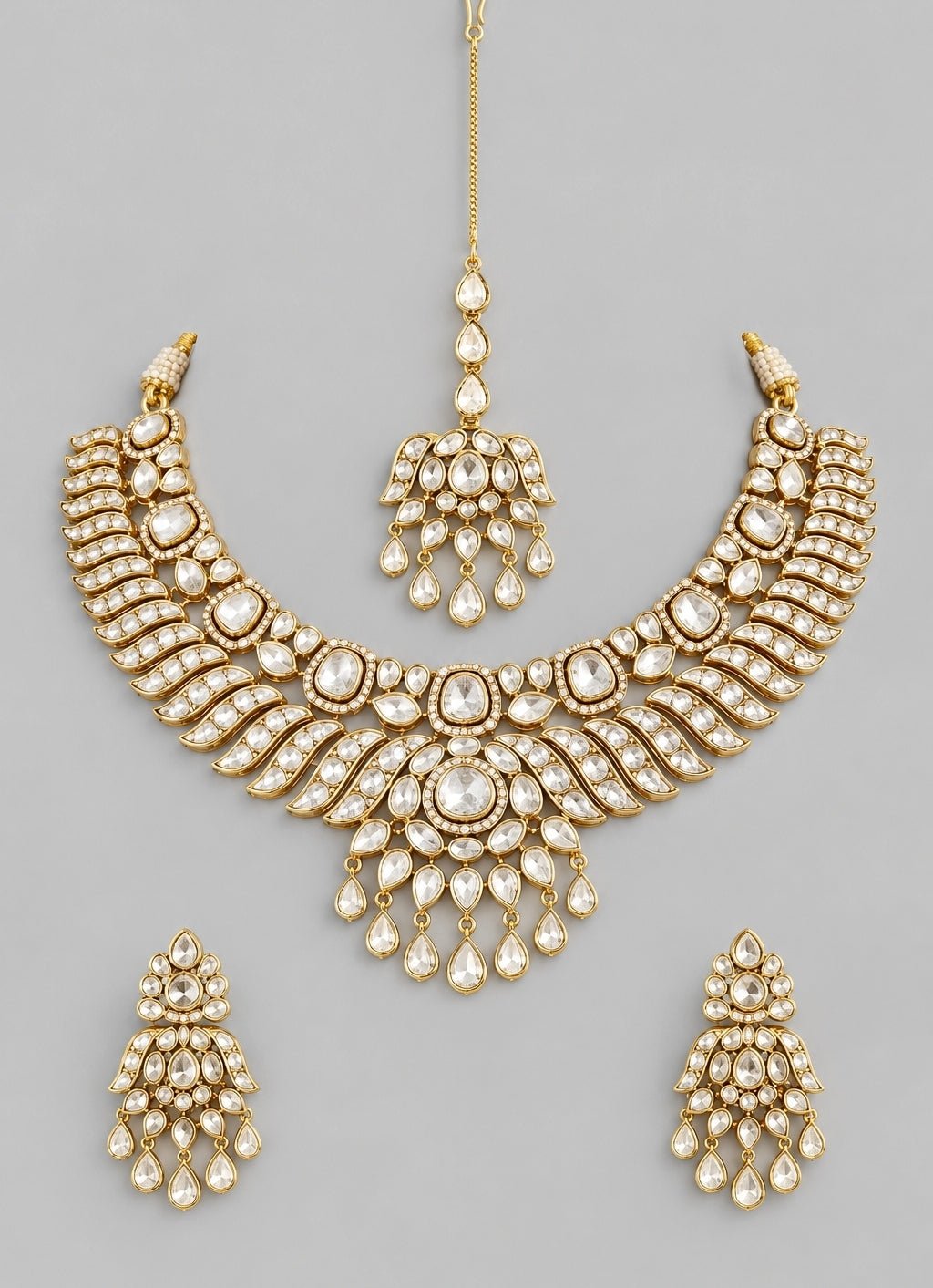 Zevar by Geeta Gold Finish Kundan Bridal Necklace SetFabilicious Fashion