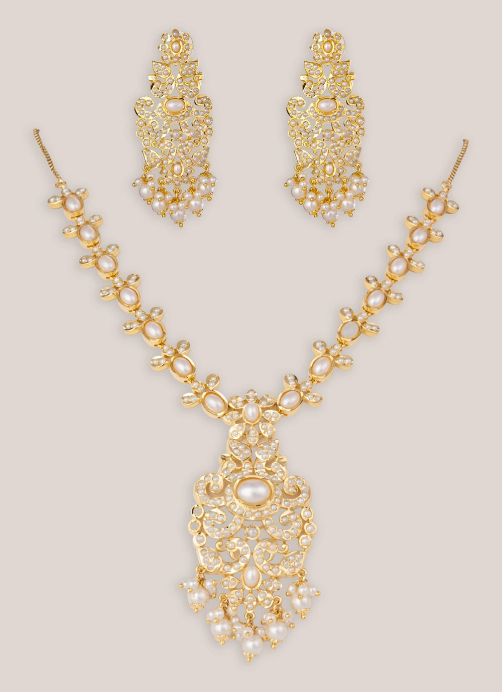 Zevar by Geeta Gold Finish Traditional Jadau Necklace SetFabilicious Fashion
