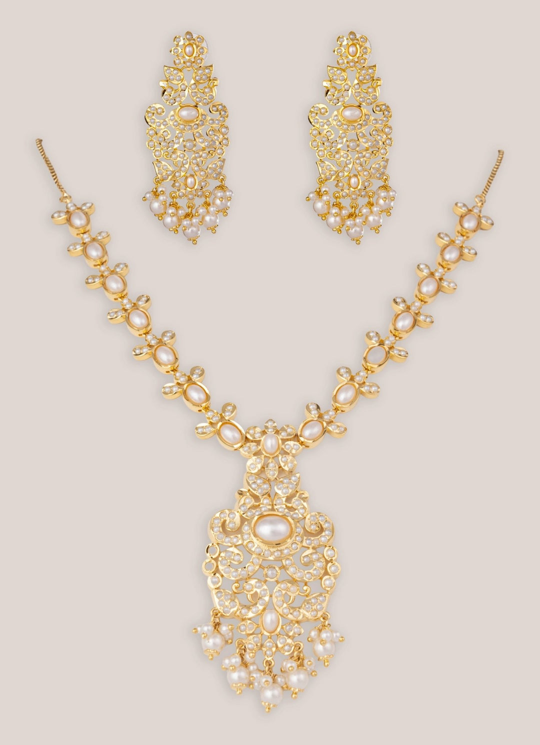Zevar by Geeta Gold Finish Traditional Jadau Necklace SetFabilicious Fashion