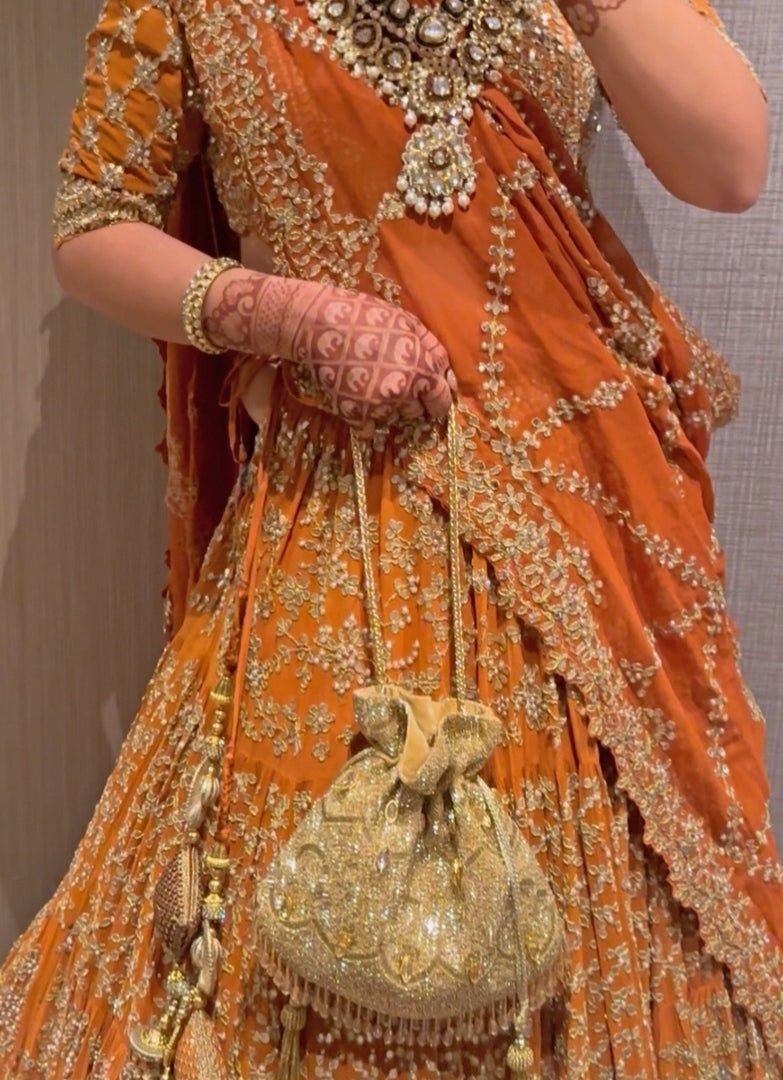 Gold Georgette Embellished Potli House of Kosha - Fabilicious Fashion