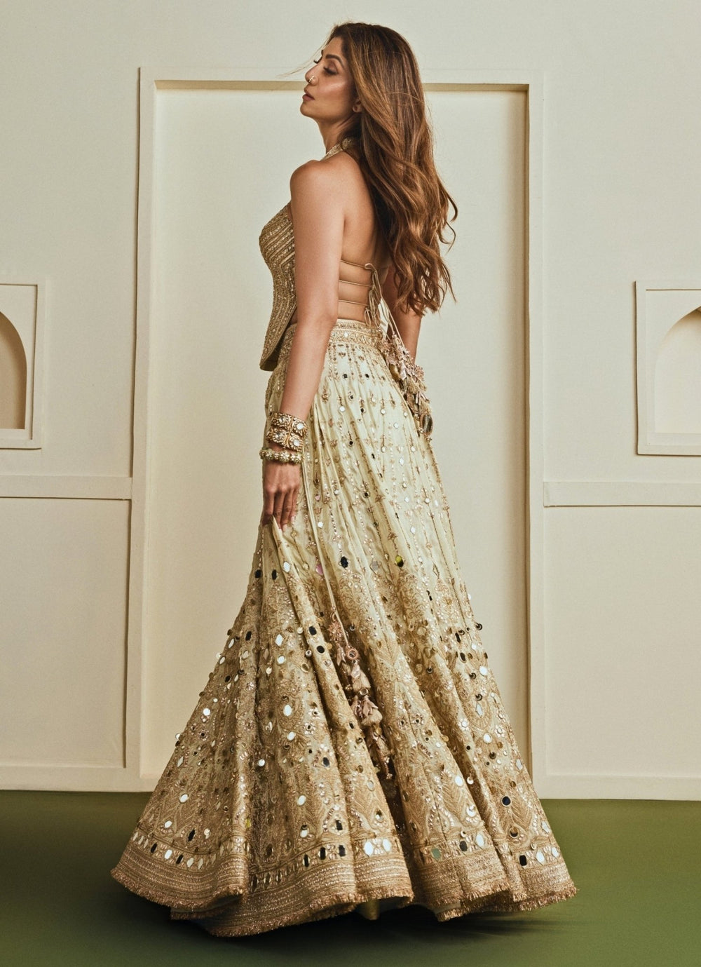 Gopi Vaid Gold Mirrorwork Tissue Corset Lehenga SetFabilicious Fashion