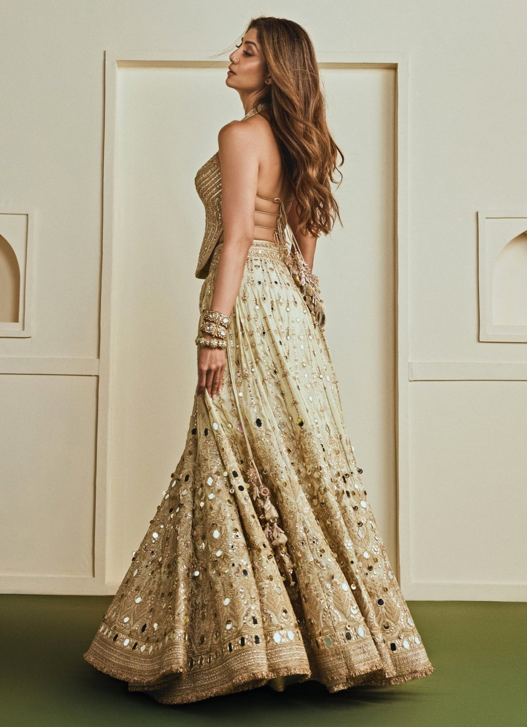 Gopi Vaid Gold Mirrorwork Tissue Corset Lehenga SetFabilicious Fashion