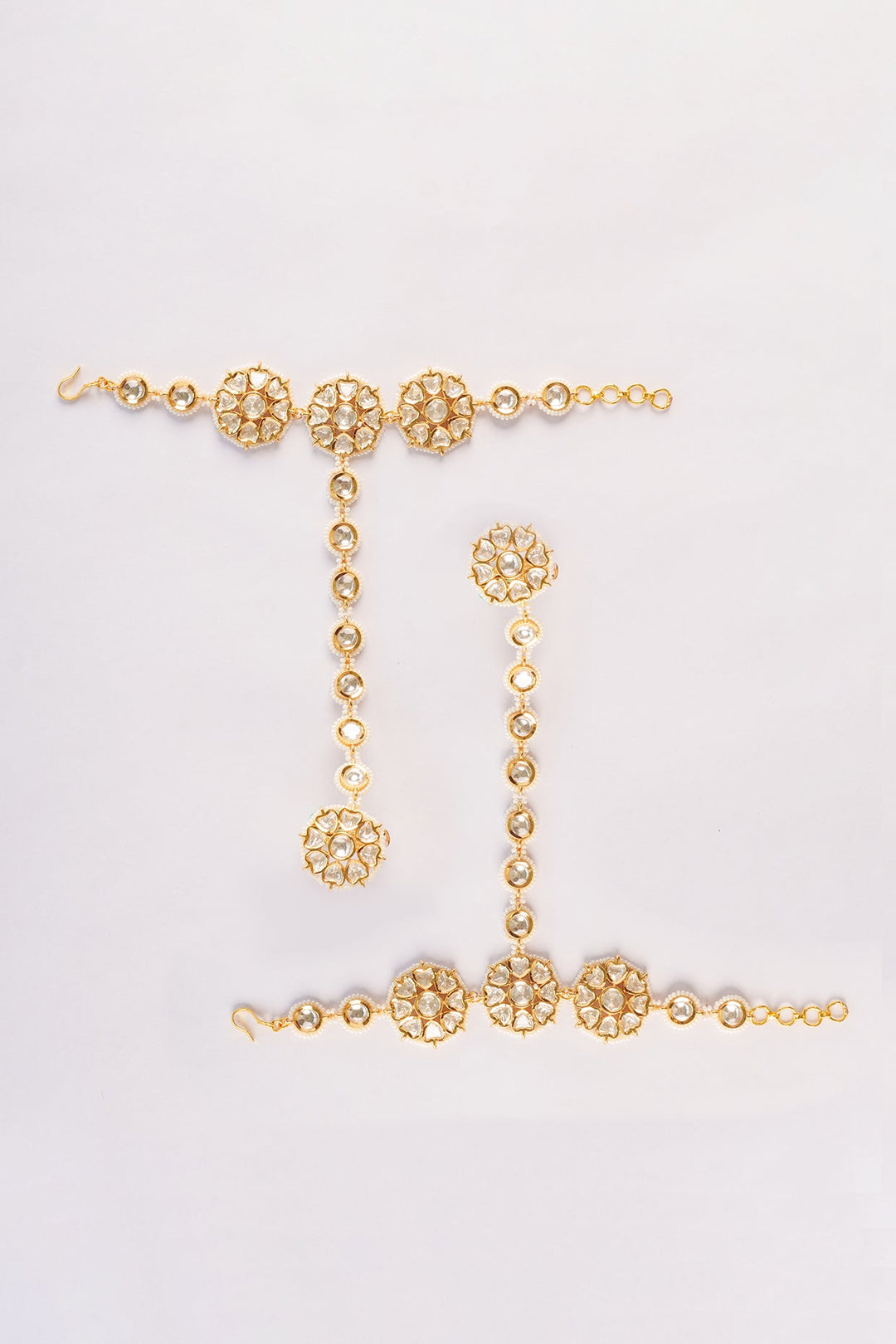 Gold Plated Floral Kundan And White Stone Hathphools Zevar by Geeta - Fabilicious Fashion
