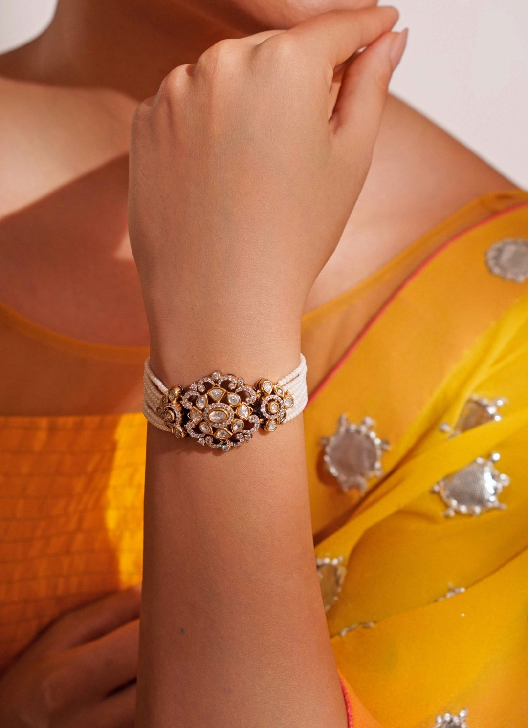 Gold Plated Kundan Crystal Studded Bracelet With White Beads Zevar by Geeta - Fabilicious Fashion