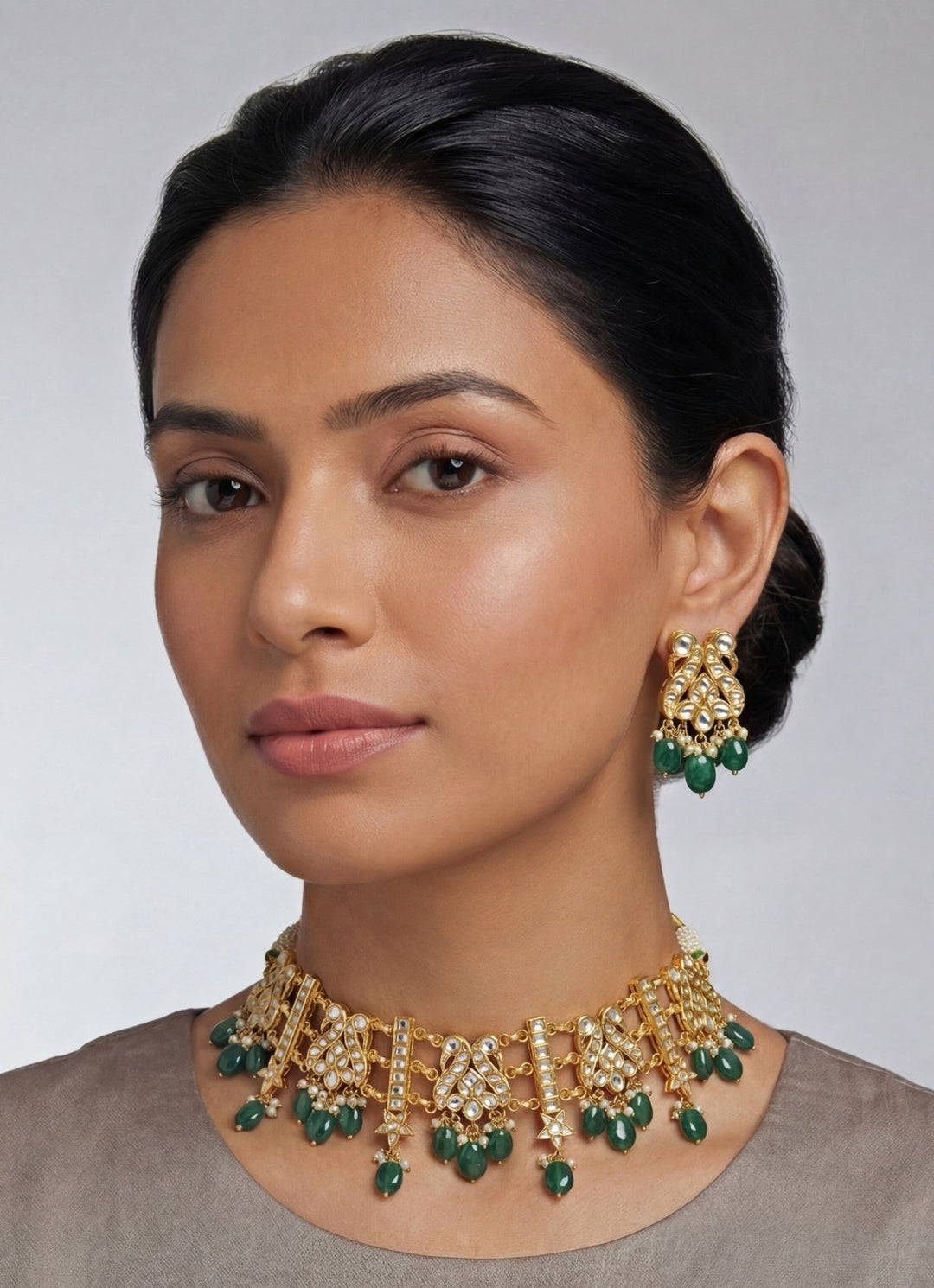 Zevar by Geeta Gold Plated Kundan Necklace Set With Green Pearl DropsFabilicious Fashion