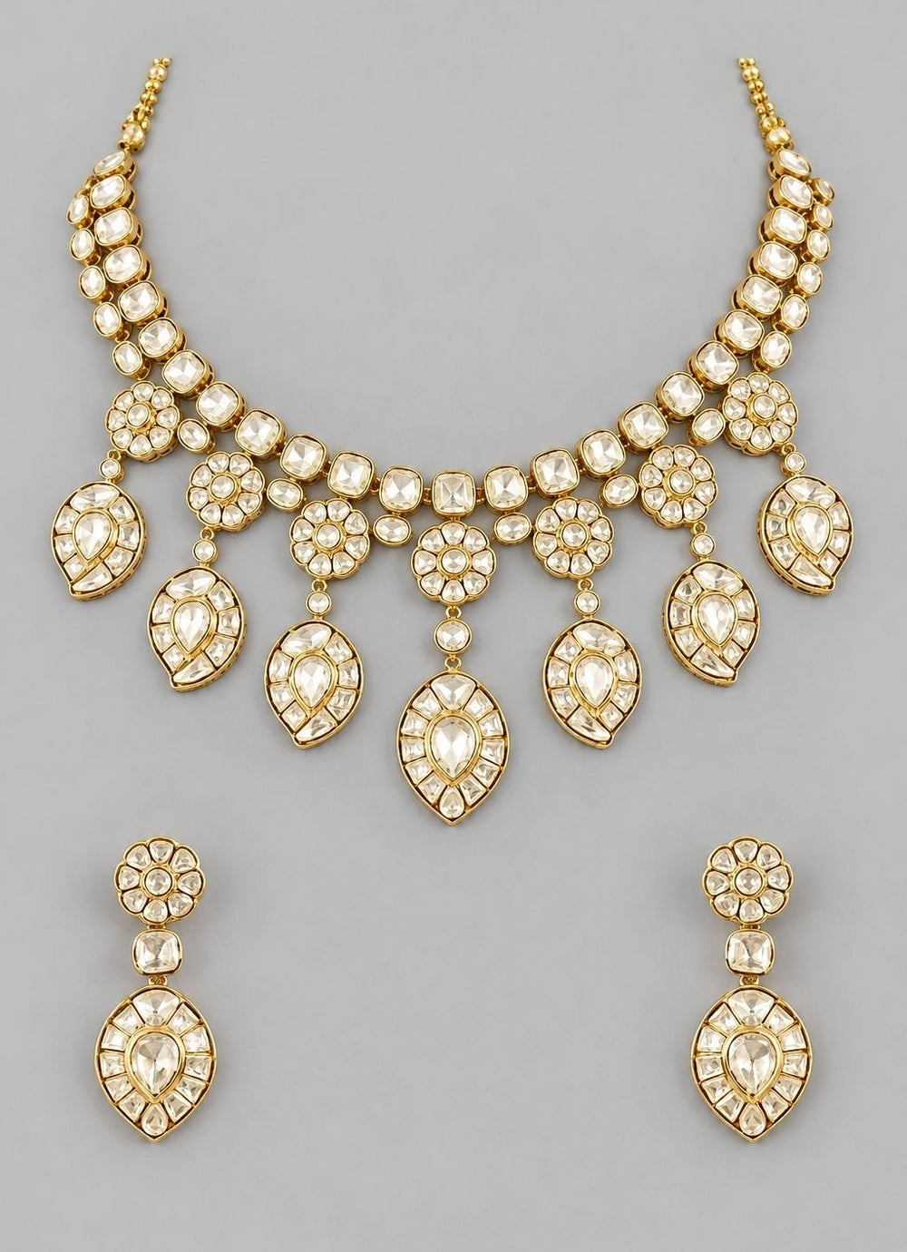 Zevar by Geeta Gold Plated Kundan Necklace SetFabilicious Fashion