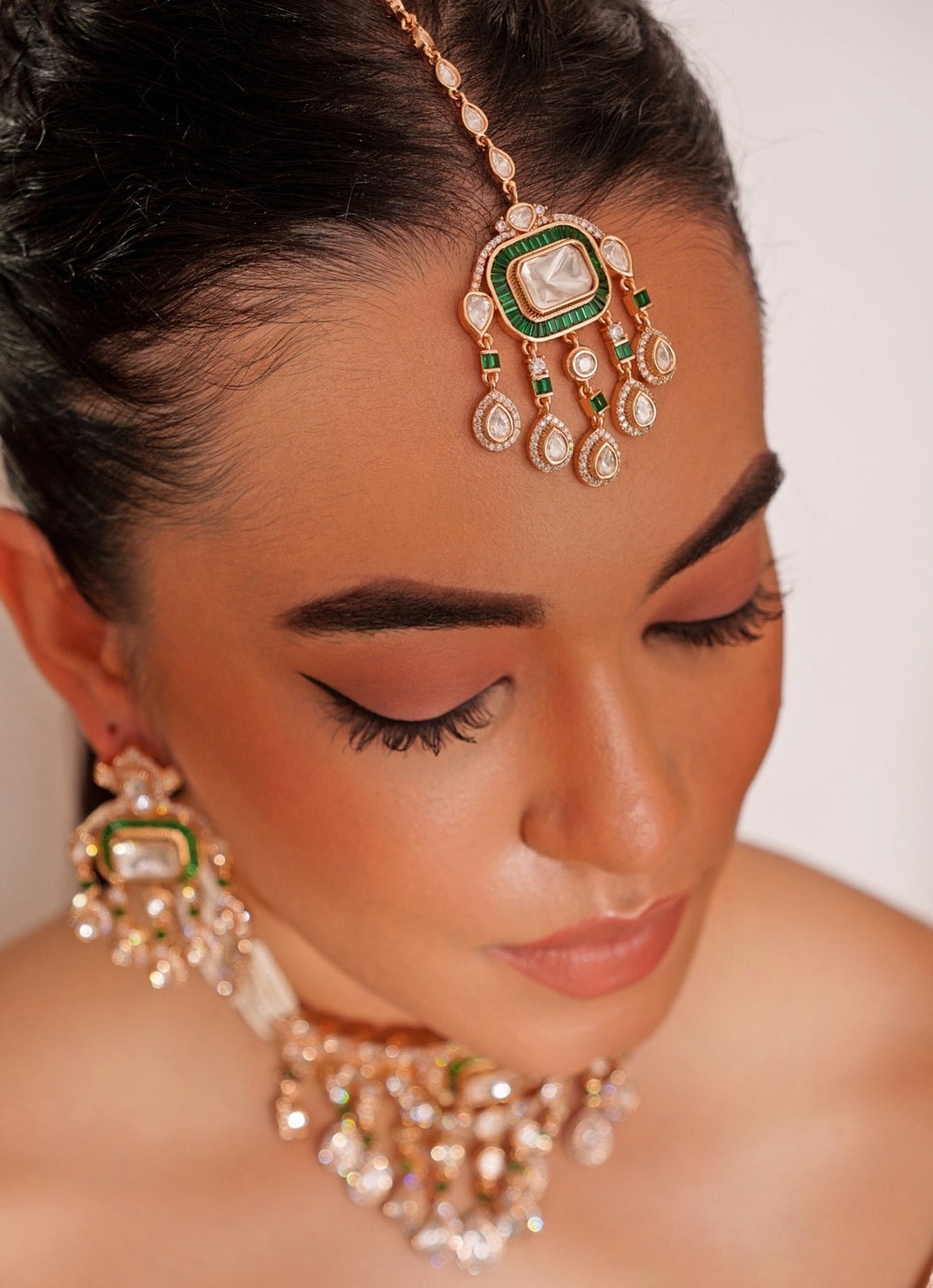 Gold Plated Polki And Green Stone Choker Set With Maangtikka Zevar by Geeta - Fabilicious Fashion