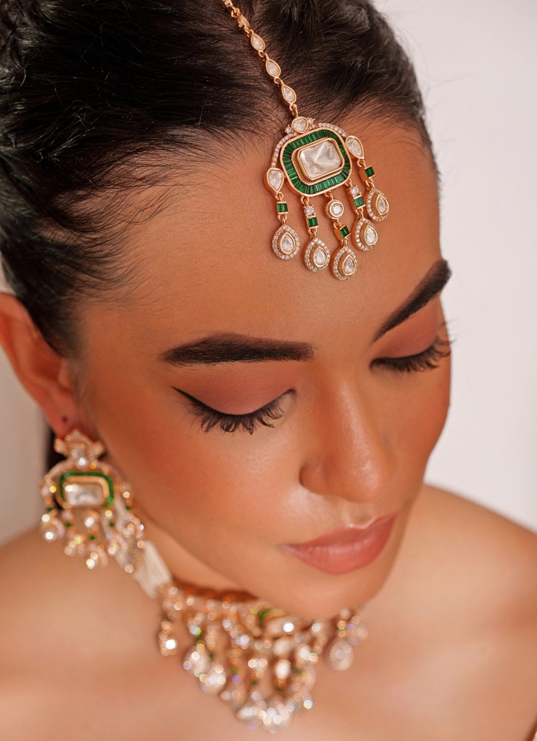 Gold Plated Polki And Green Stone Choker Set With Maangtikka Zevar by Geeta - Fabilicious Fashion