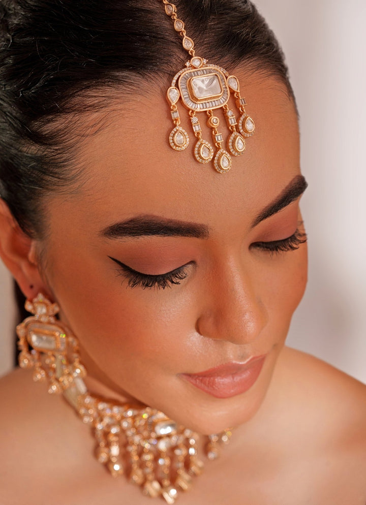 Gold Plated Polki And White Stone Choker Set With Maangtikka Zevar by Geeta - Fabilicious Fashion