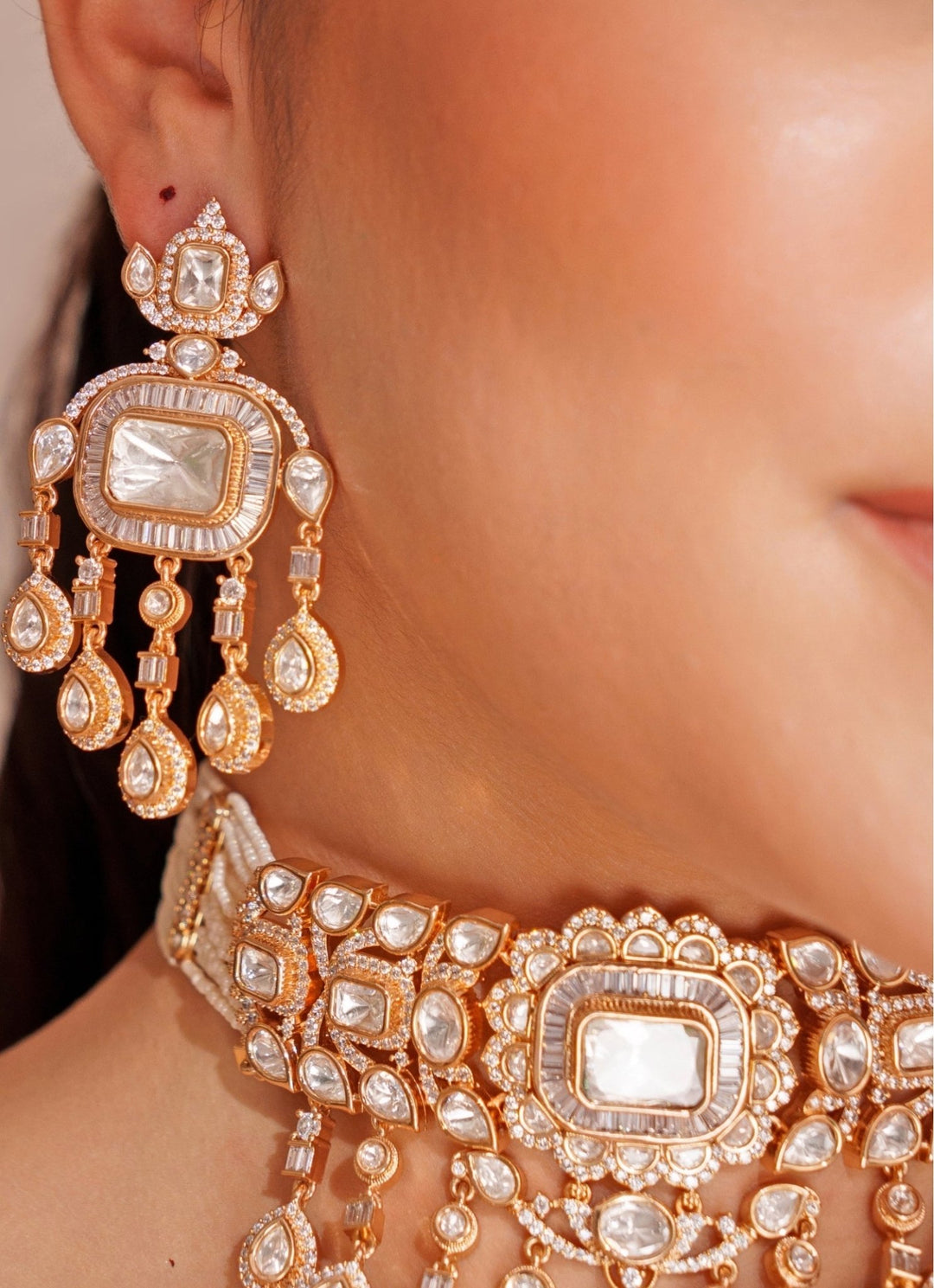 Gold Plated Polki And White Stone Choker Set With Maangtikka Zevar by Geeta - Fabilicious Fashion