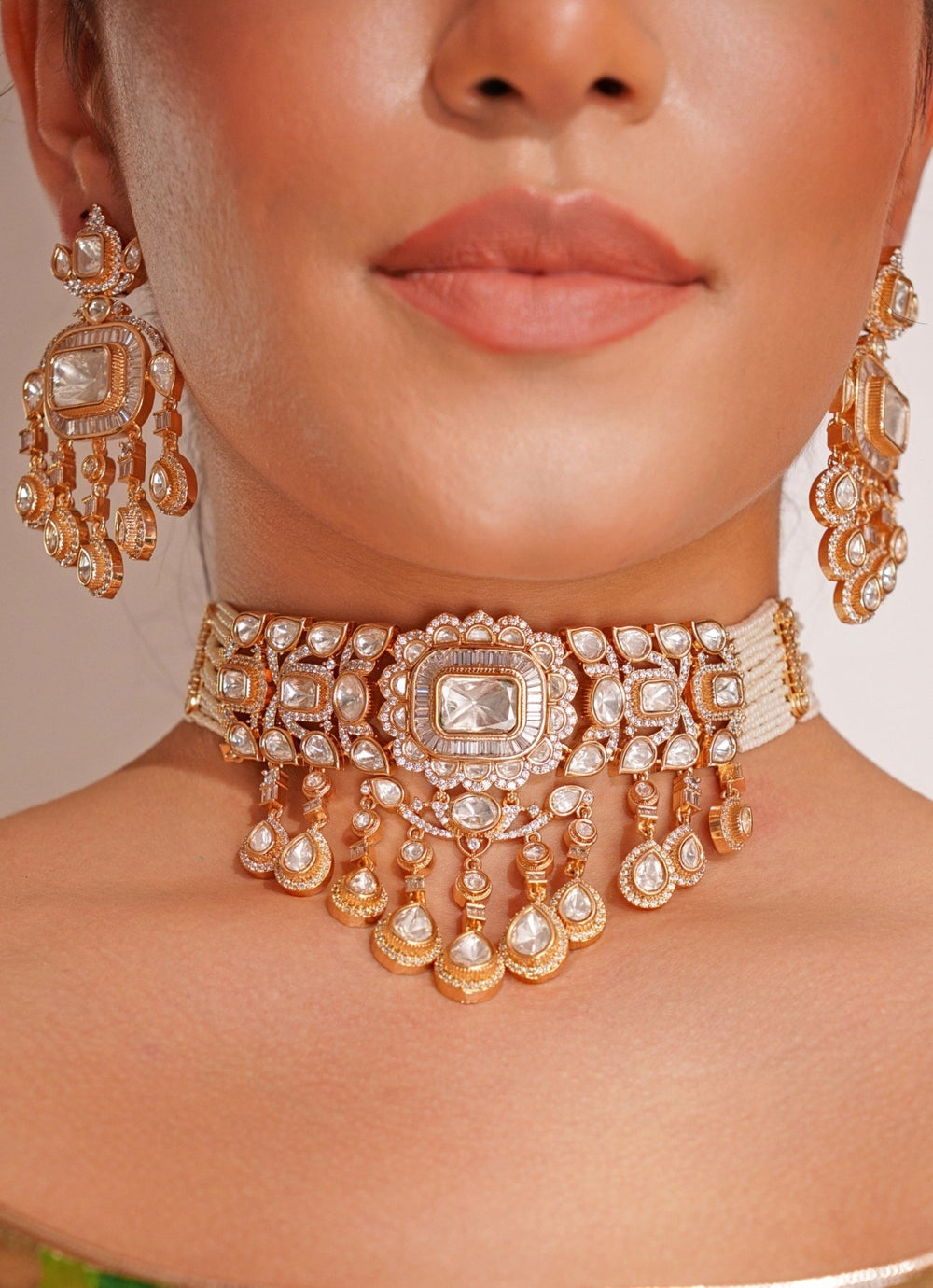 Gold Plated Polki And White Stone Choker Set With Maangtikka Zevar by Geeta - Fabilicious Fashion