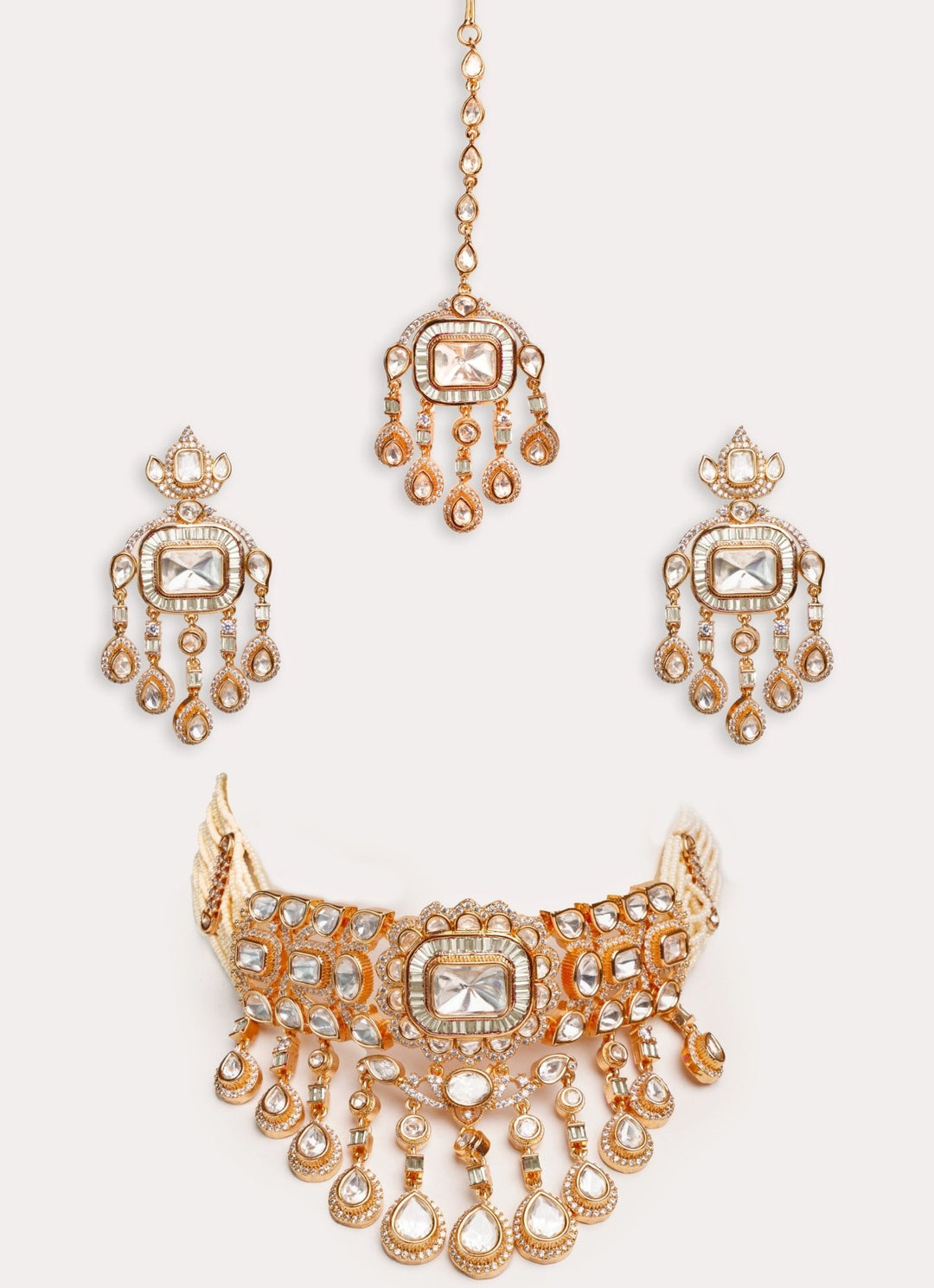 Gold Plated Polki And White Stone Choker Set With Maangtikka Zevar by Geeta - Fabilicious Fashion