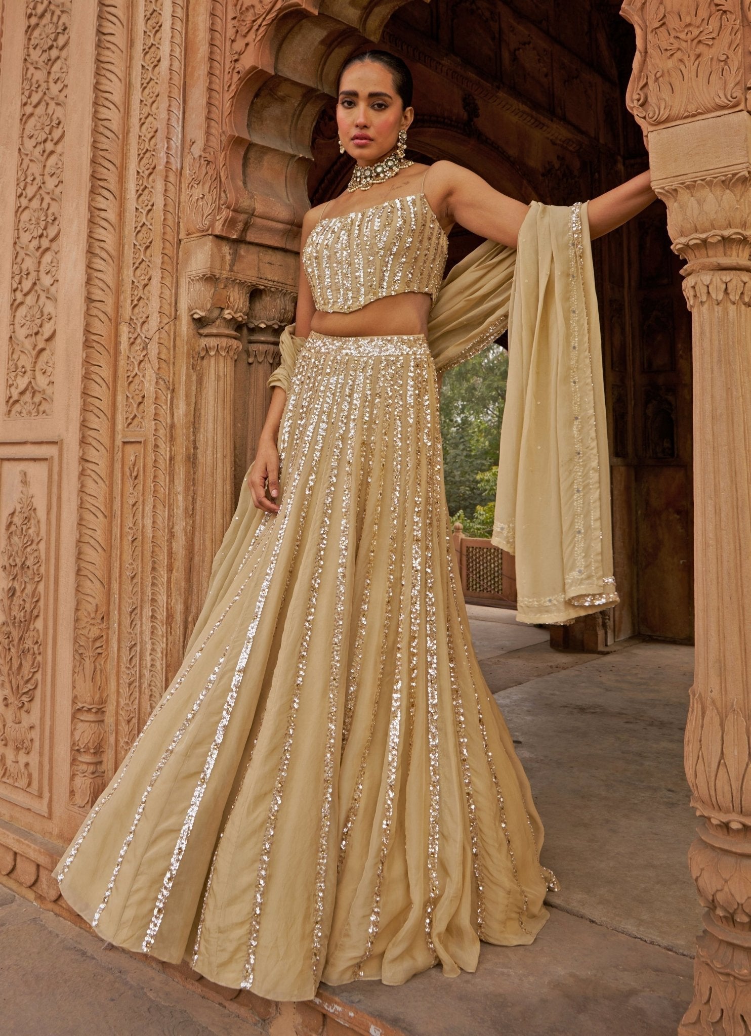 Nidhika Shekhar golden sequin corset lehenga — modern lehenga with contemporary blouse