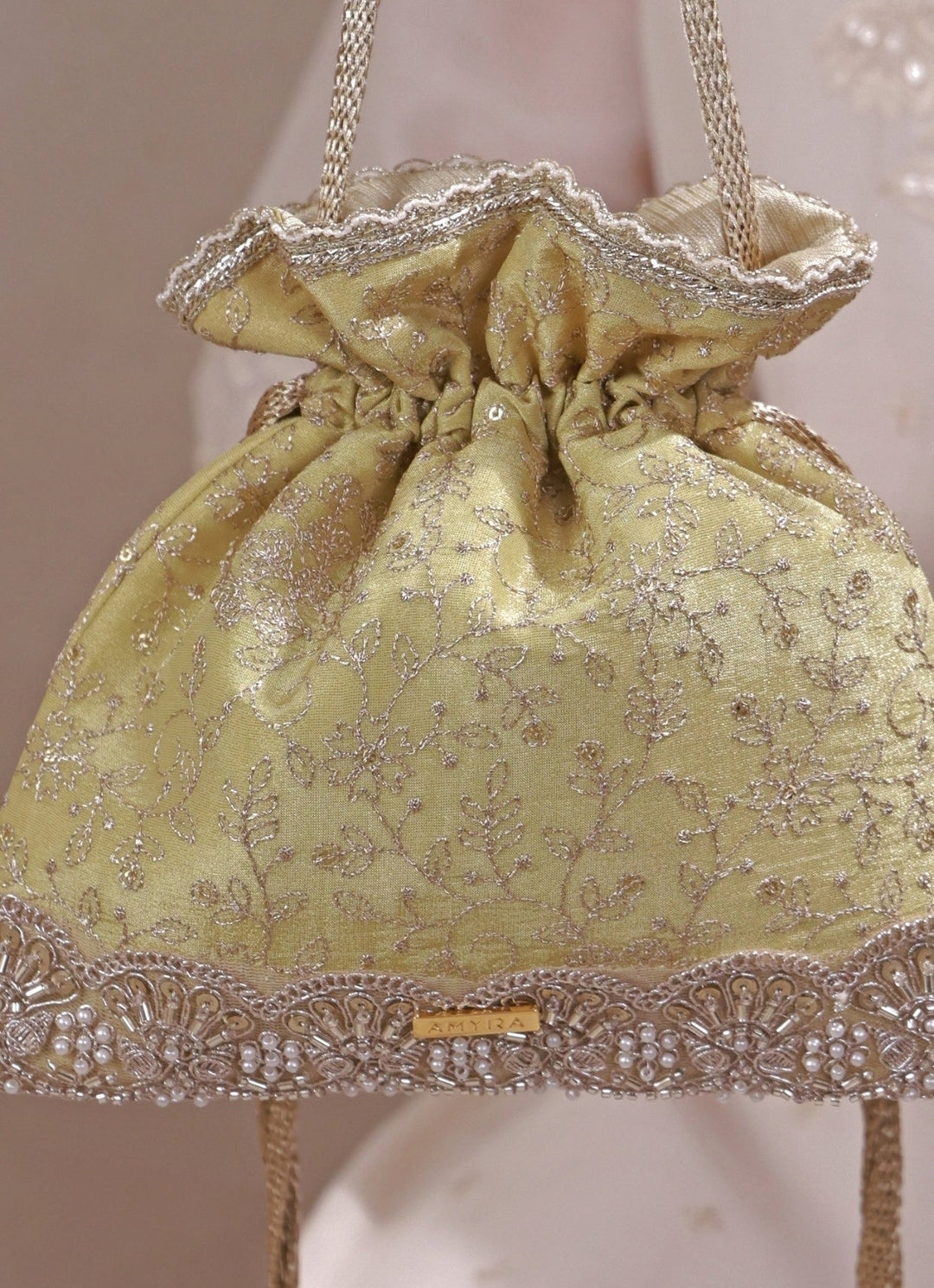 Amyra Green Embroidered Tissue Silk PotliFabilicious Fashion
