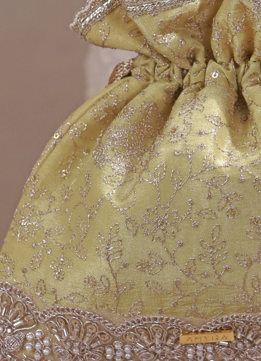 Amyra Green Embroidered Tissue Silk PotliFabilicious Fashion