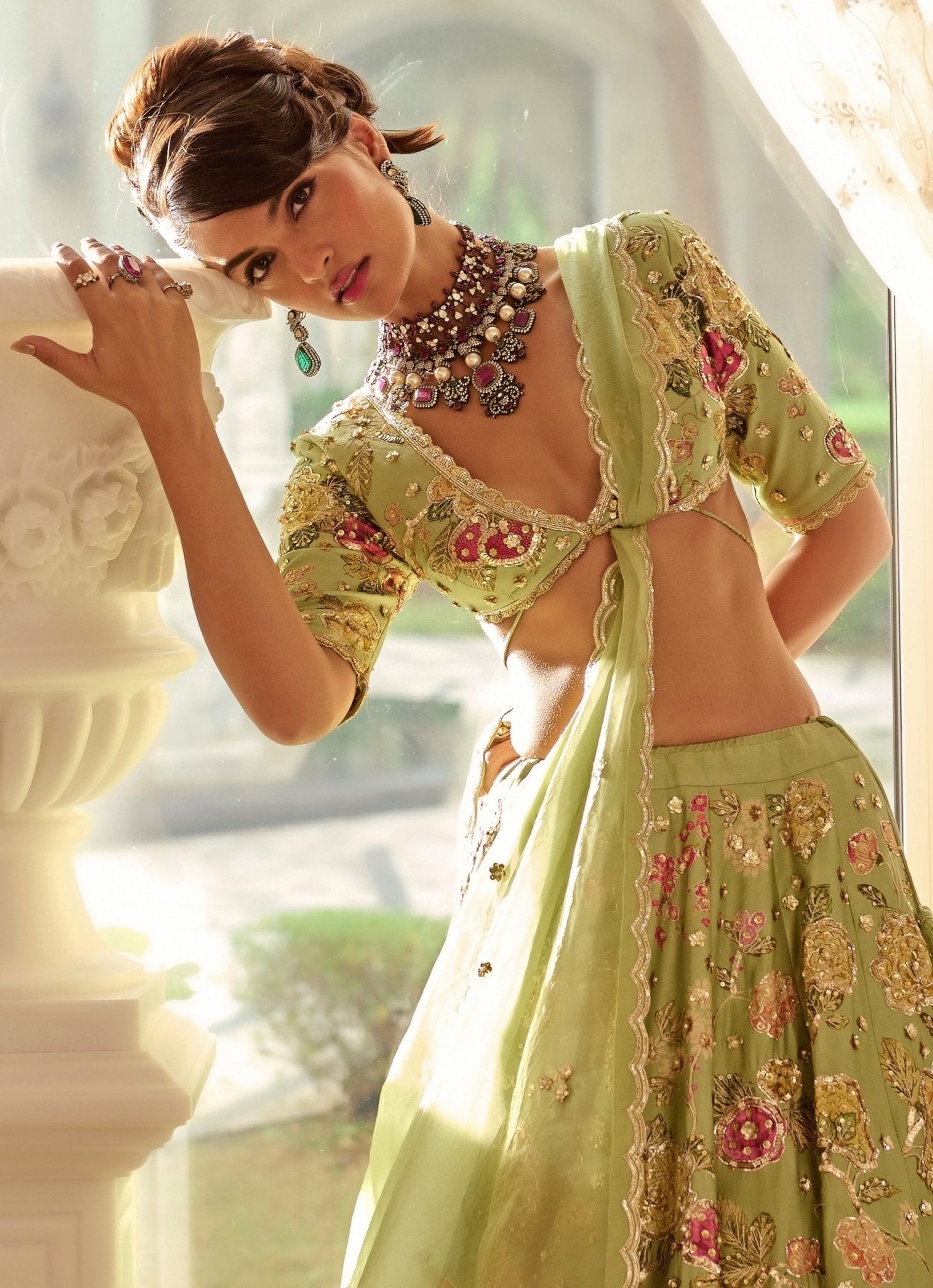 Green floral silk lehenga for mehendi London by Paulmi and Harsh