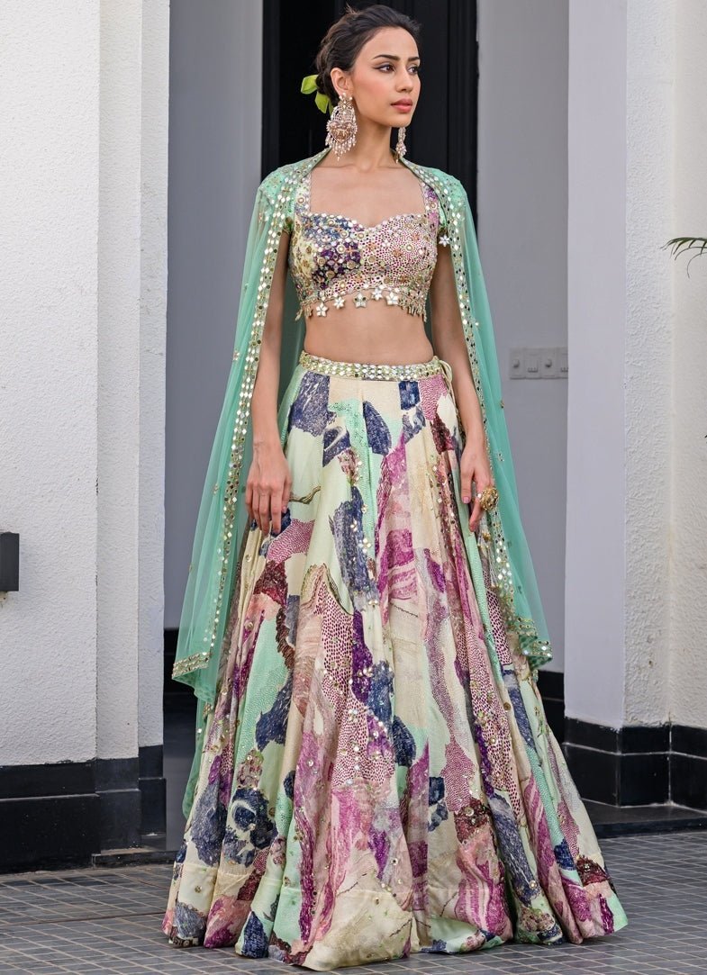 Green printed satin lehenga with mirror work statement blouse for pear-shaped body type