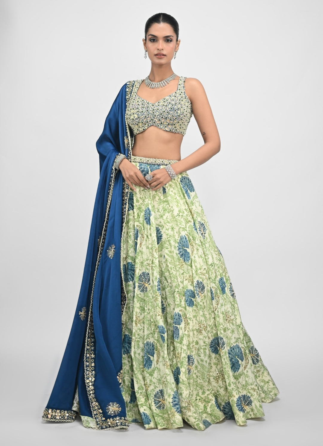 Green Printed Silk Lehenga Set With Contrasting Embroidered Blue Dupatta Juhi Bengani - Fabilicious Fashion