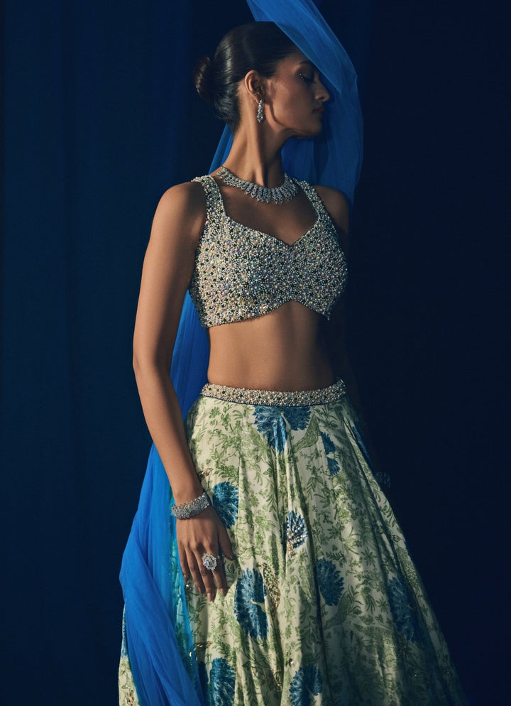 Green Printed Silk Lehenga Set With Contrasting Embroidered Blue Dupatta Juhi Bengani - Fabilicious Fashion