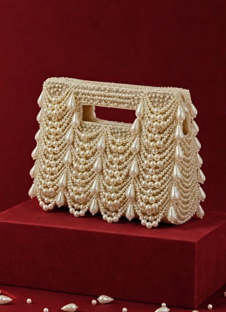 House of Kosha Ivory and Gold Georgette Pearl Embellished ClutchFabilicious Fashion