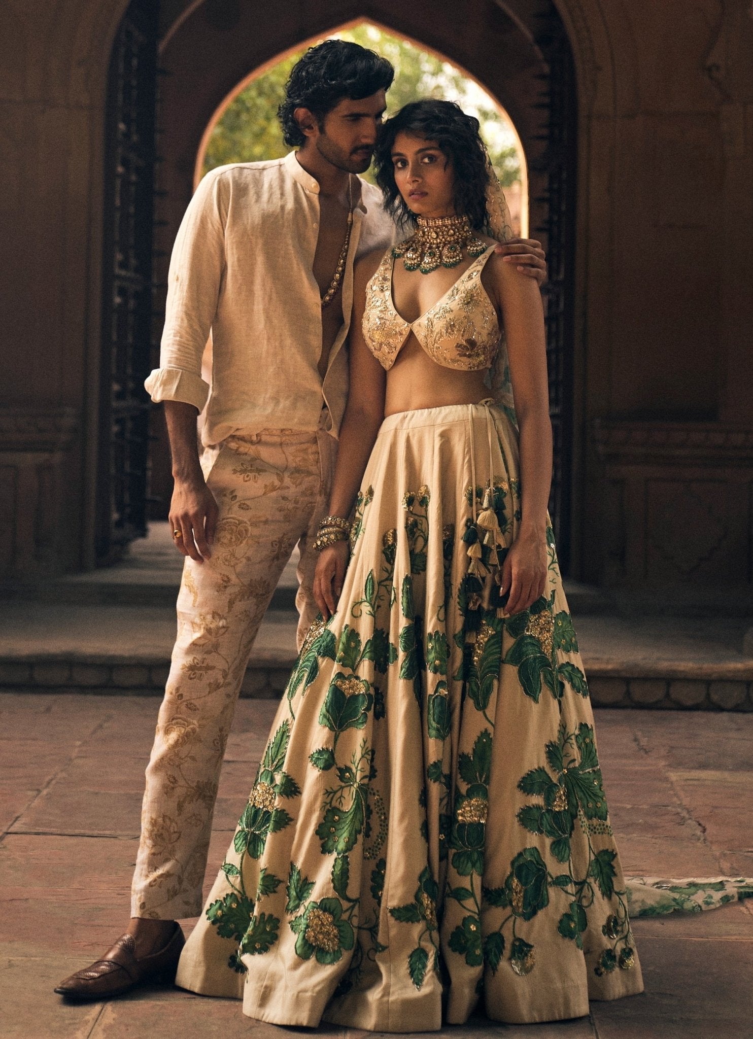 Ivory and green floral printed lehenga for destination weddings by Paulmi and Harsh