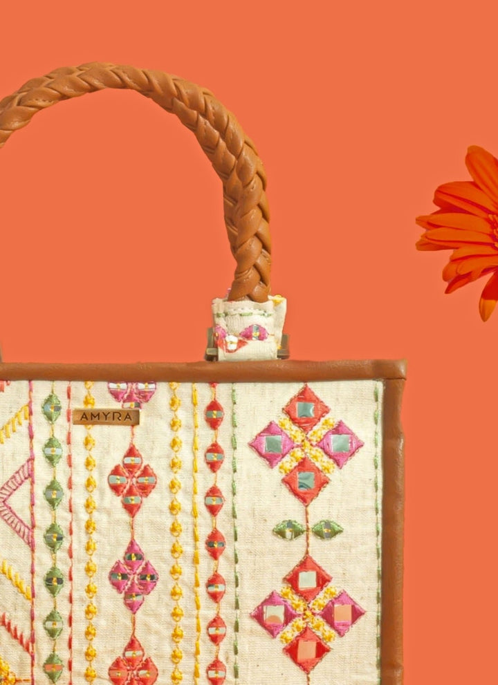 Amyra Ivory And Multicolor Cotton HandbagFabilicious Fashion