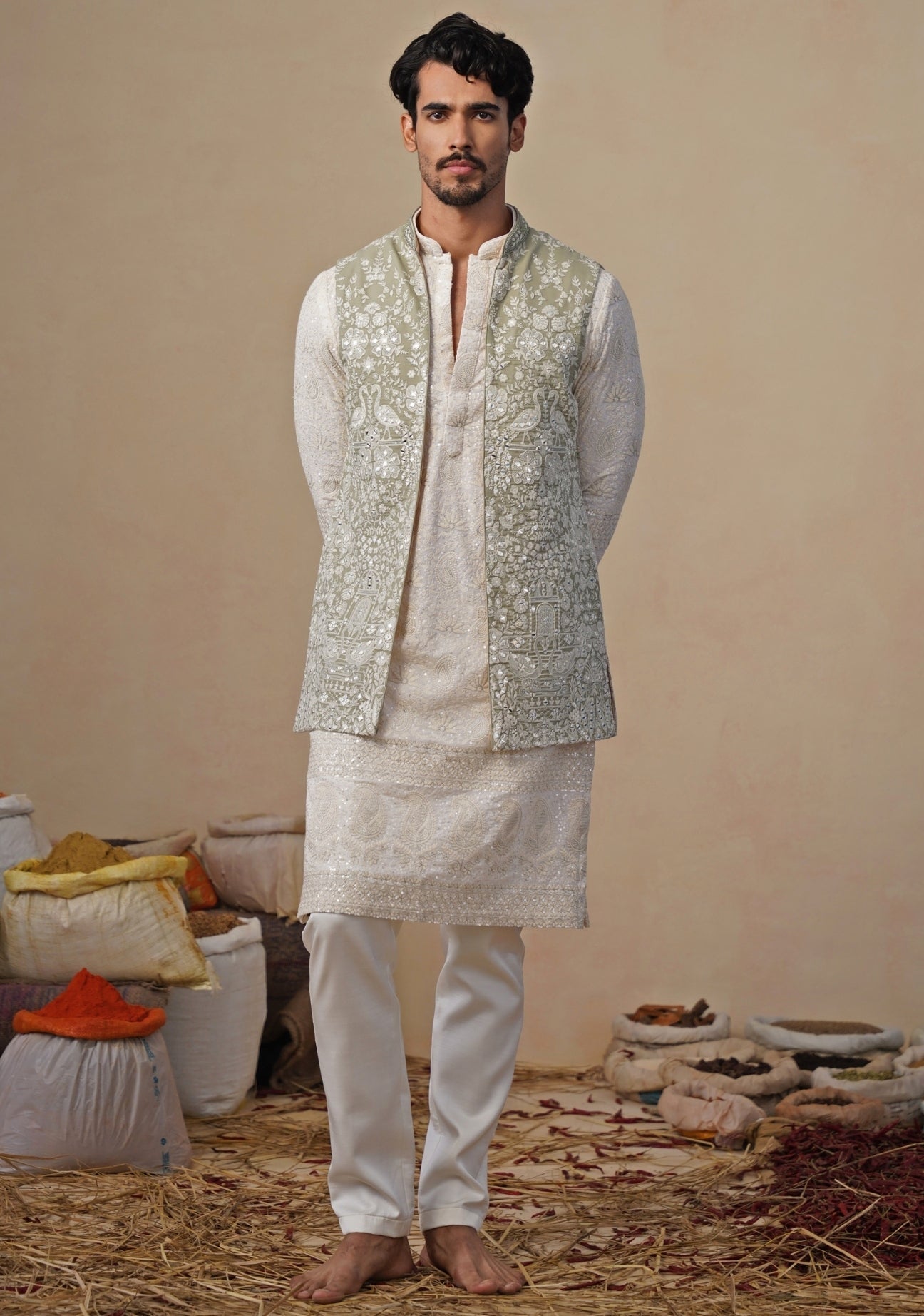 Ivory and pastel green georgette kurta jacket set for modern Indian festive menswear