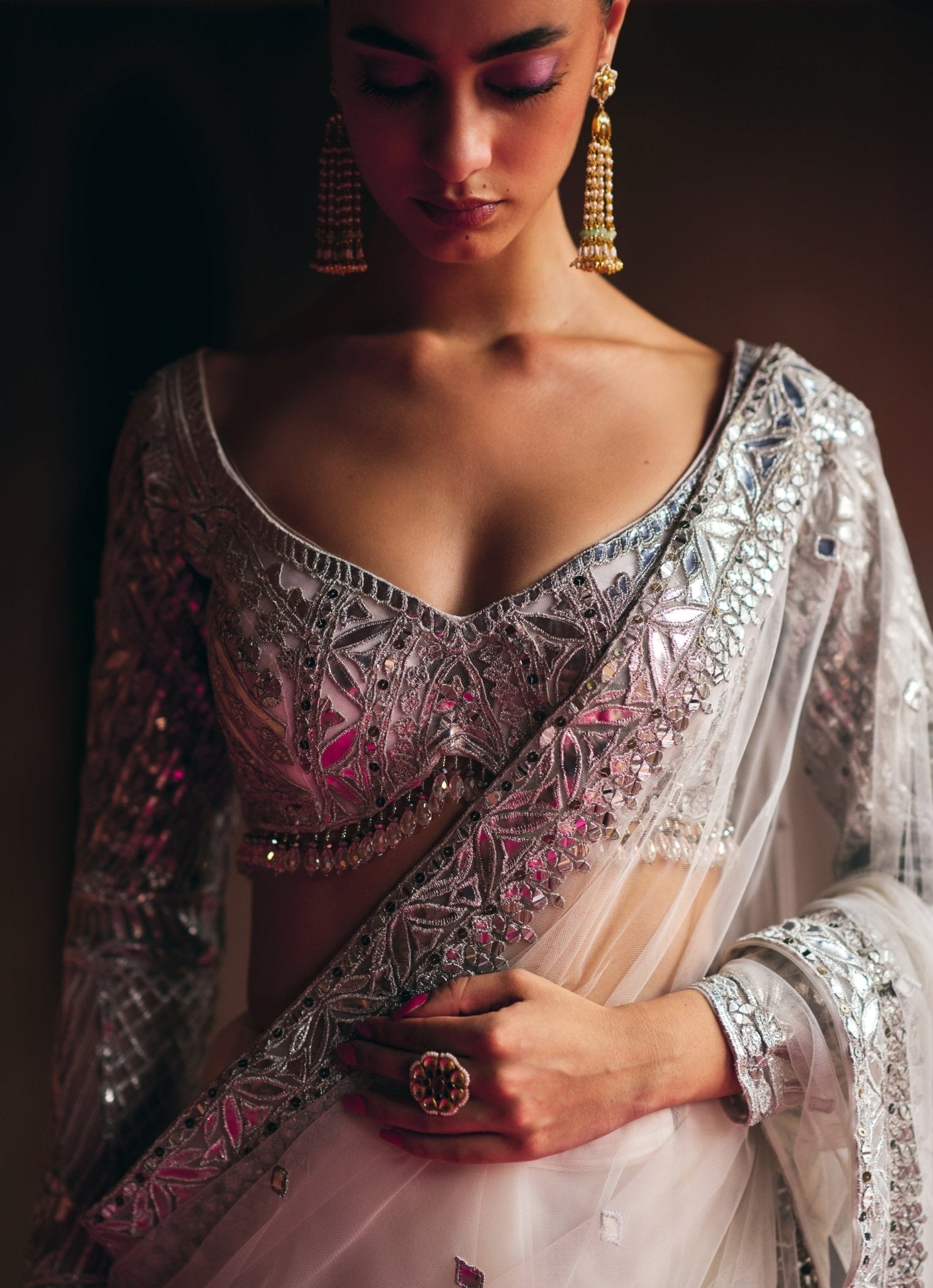Ivory saree outfit idea for day wedding guests with silver embroidery