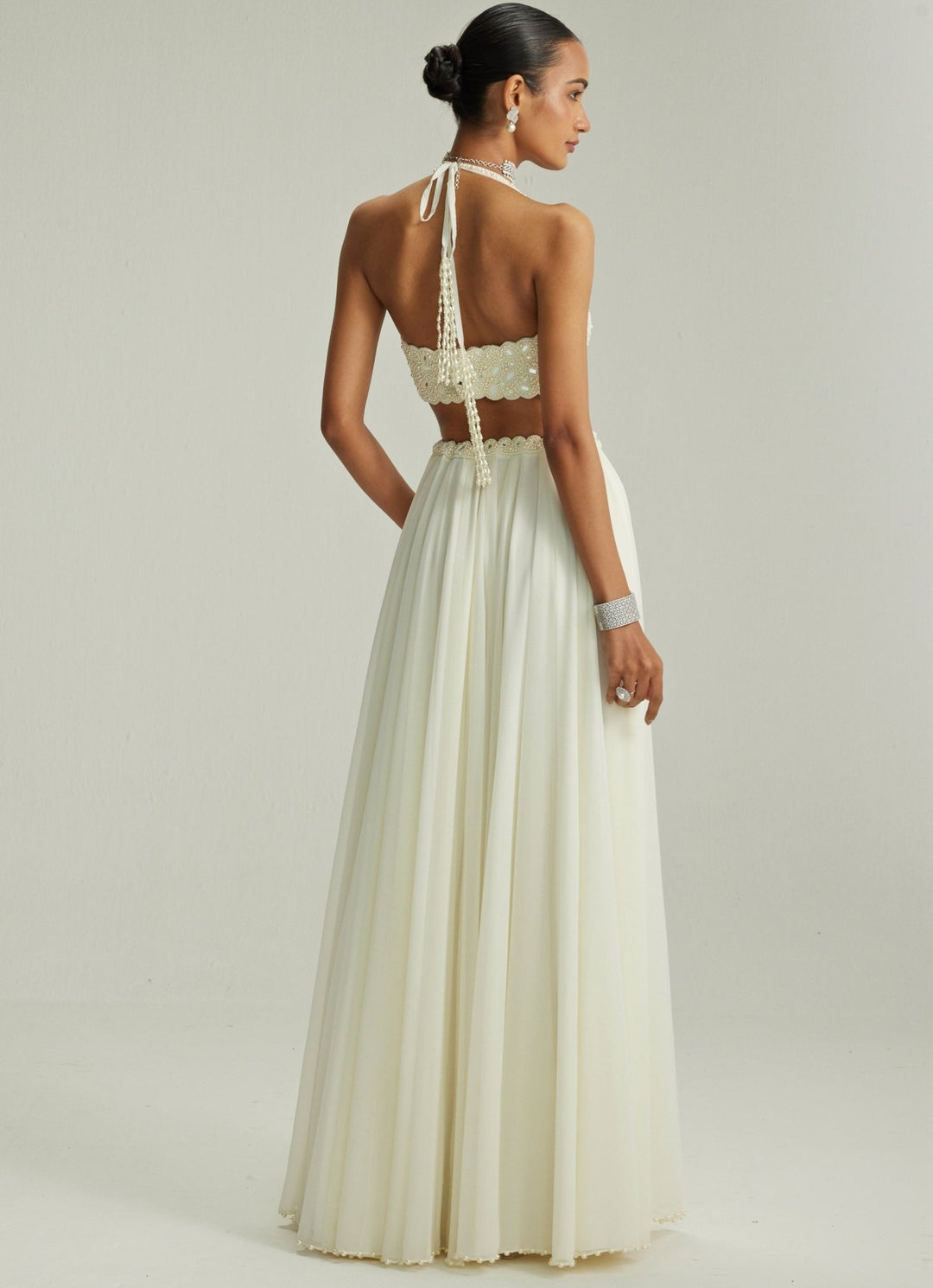 Ivory Embroidered Georgette Lehenga With Halter Blouse Vvani by Vani Vats - Fabilicious Fashion