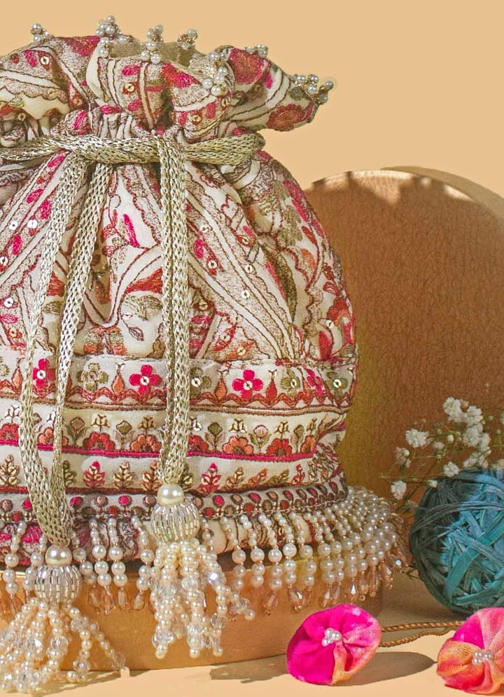 Ivory Embroidered Georgette Potli Amyra - Fabilicious Fashion