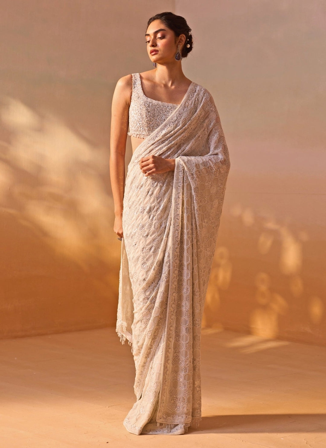Nitika Gujral Ivory Embroidered Georgette SareeFabilicious Fashion