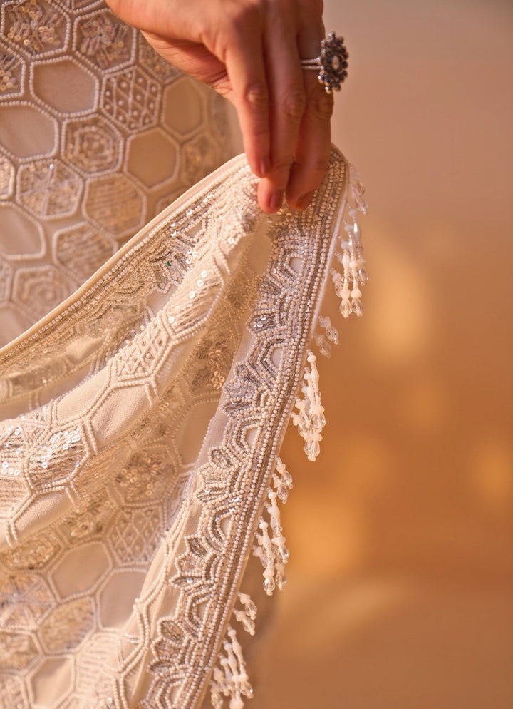 Nitika Gujral Ivory Embroidered Georgette SareeFabilicious Fashion