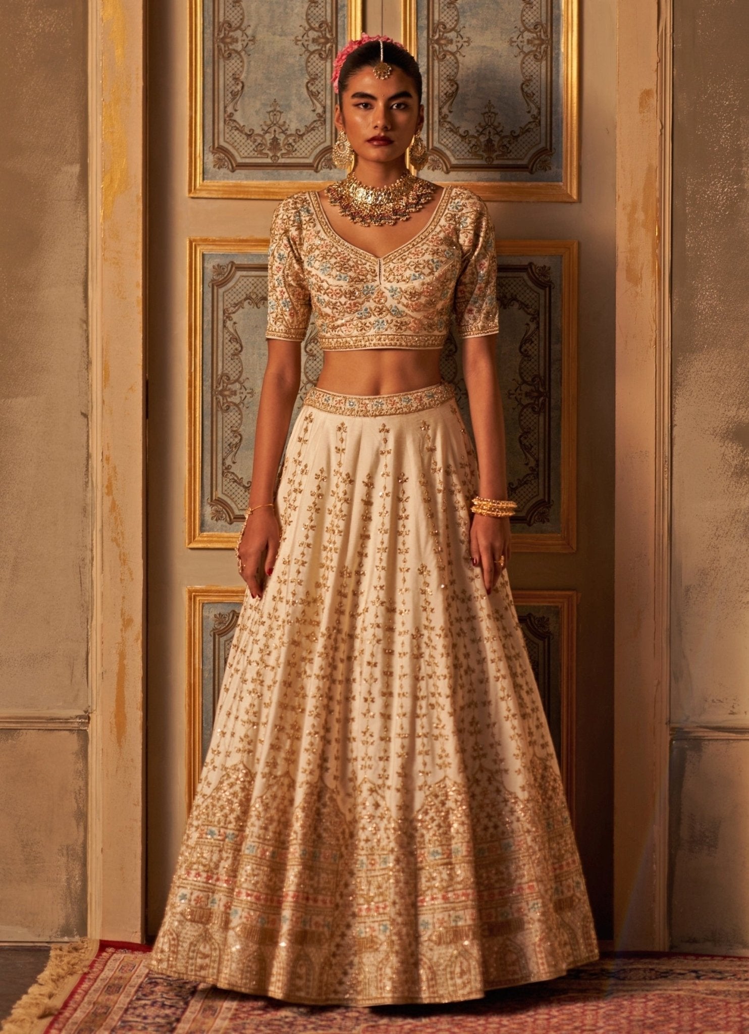 Ivory embroidered raw silk bridal lehenga with double dupatta by Angad Singh