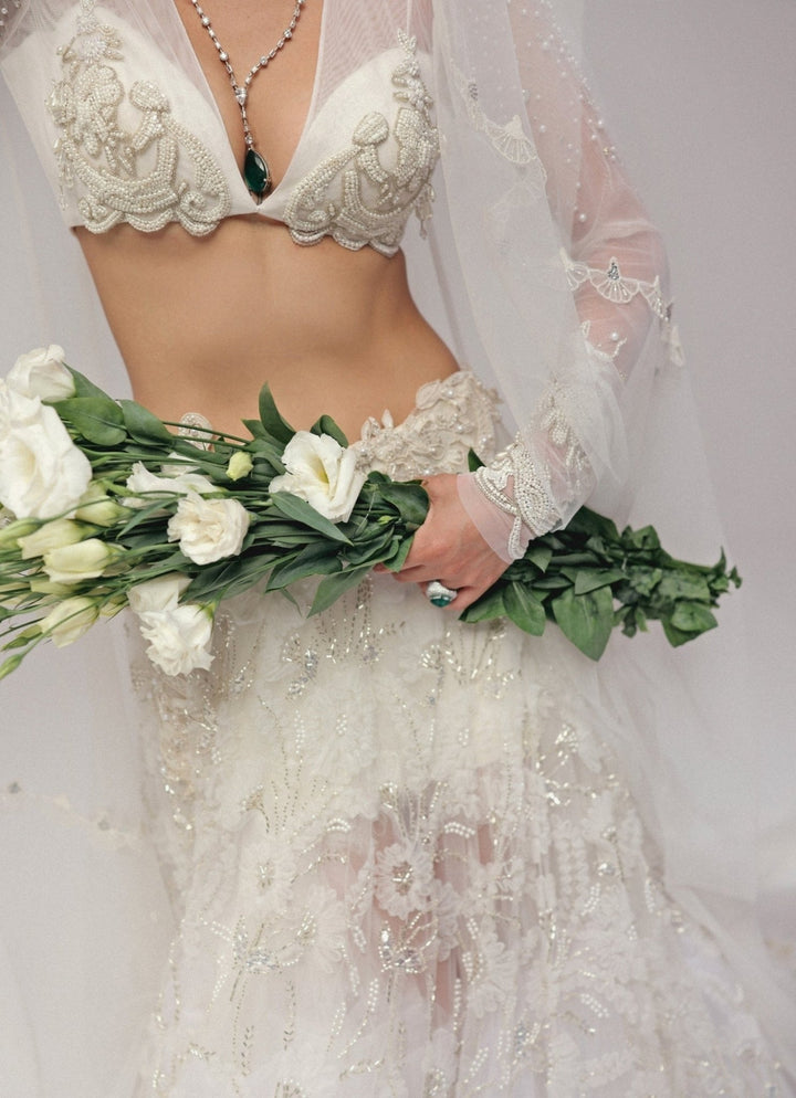 The Little Black Bow Ivory Embroidered Soft Net Bridal Lehenga SetFabilicious Fashion