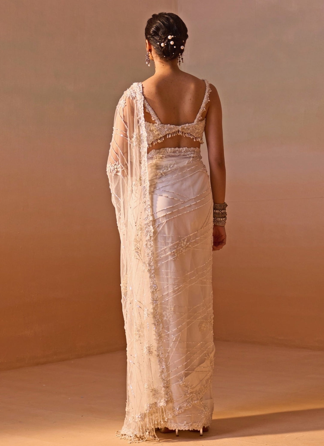 Nitika Gujral Ivory Embroidered Soft Net SareeFabilicious Fashion