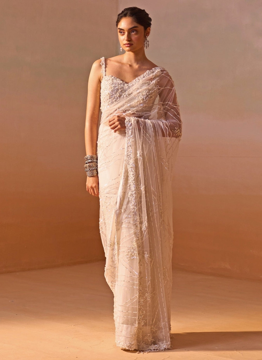 Nitika Gujral Ivory Embroidered Soft Net SareeFabilicious Fashion