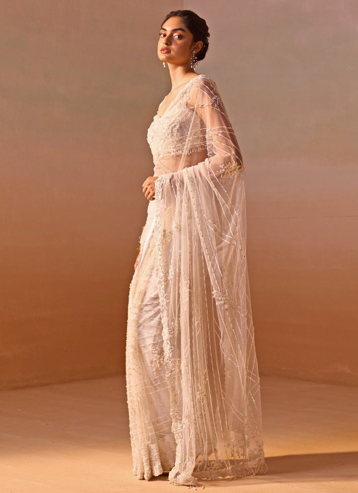Nitika Gujral Ivory Embroidered Soft Net SareeFabilicious Fashion