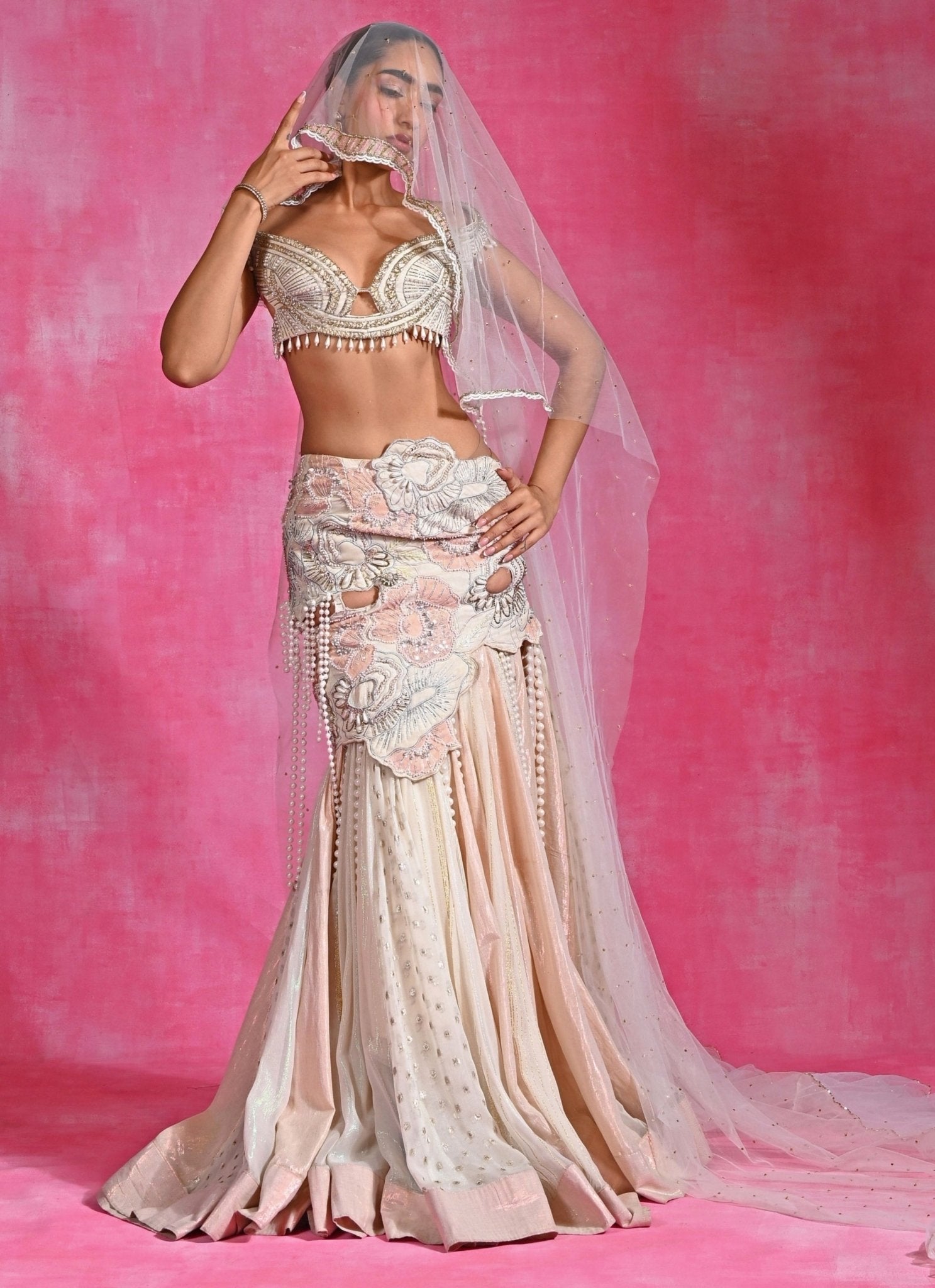 Ivory georgette crepe mermaid lehenga by Rishi and Vibhuti — mermaid lehenga for a wedding guest