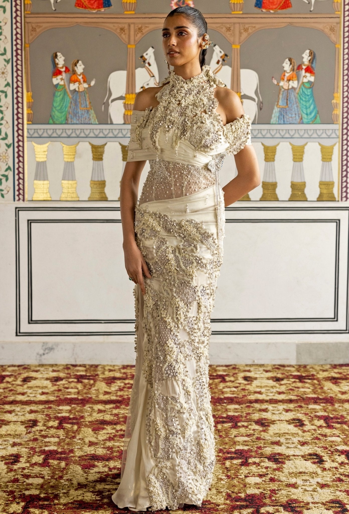 Ivory halterneck georgette drape gown by Moledro — his and hers indo-western for a wedding